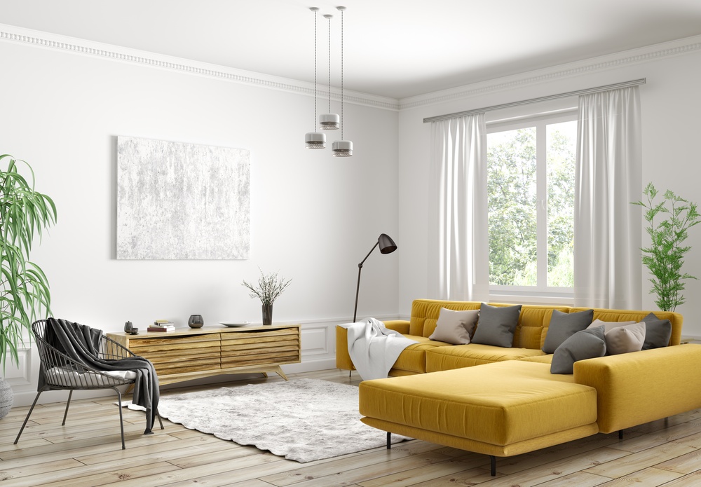 Salon w stylu skandynawskim z żółtą kanapą