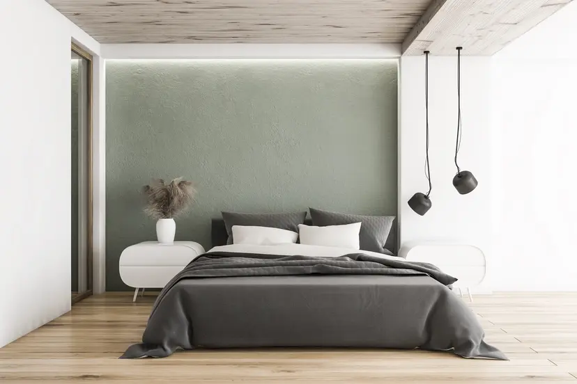 Sypialnia w kolorze szarym ze strukturalną ścianą, styl minimalistyczny. Element charakterystyczny: strukturalna ściana