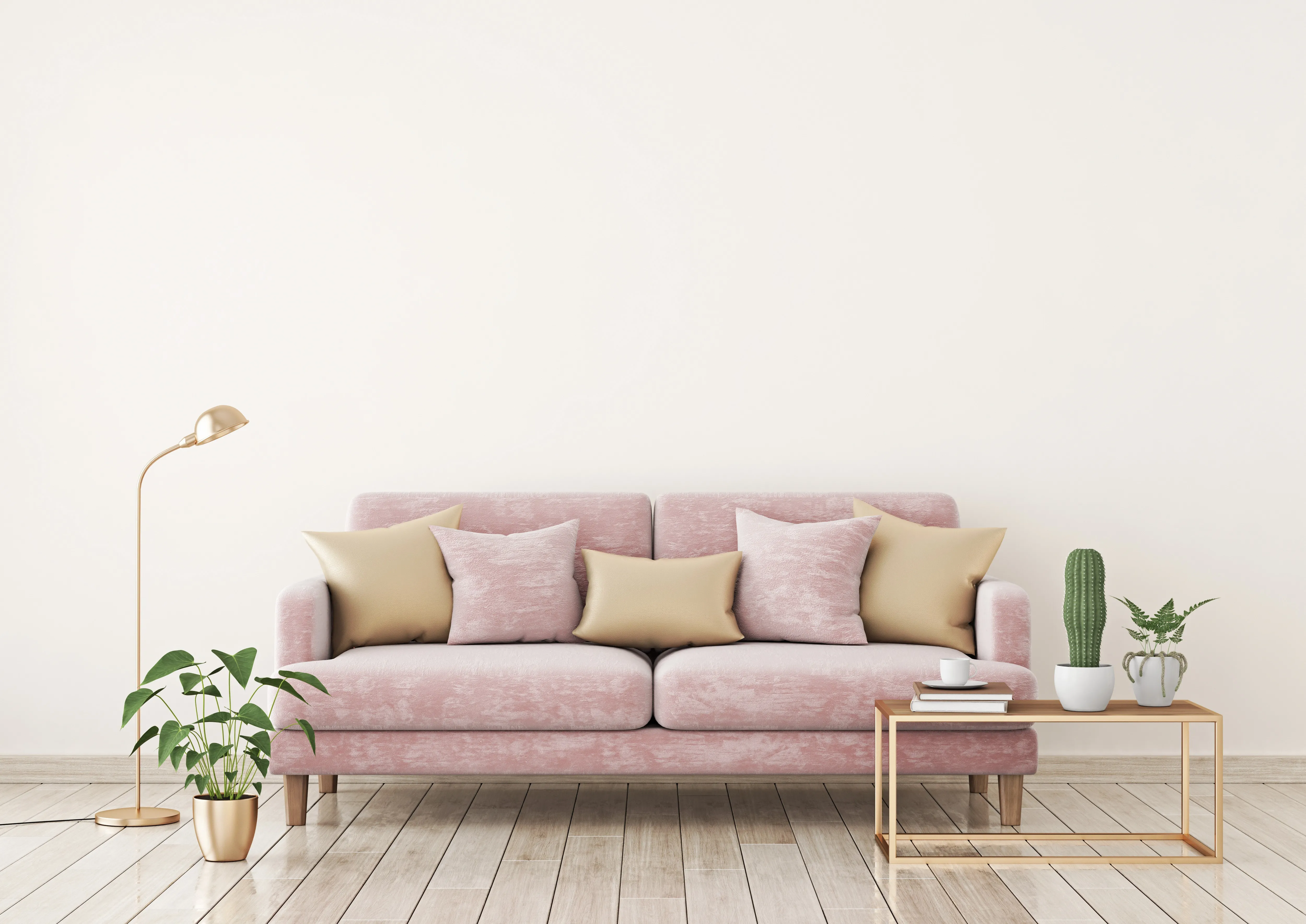 Salon w kolorze różowym w stylu skandynawskim z kanapą. Pozostałe kolory widoczne na zdjęciu to biel i beż.